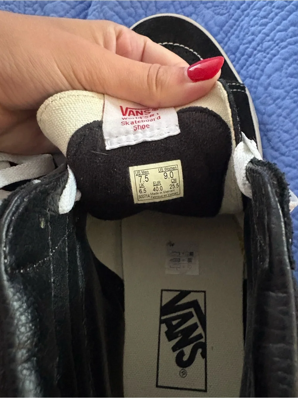 Black High-Top Van’s Sneakers with White Stripe